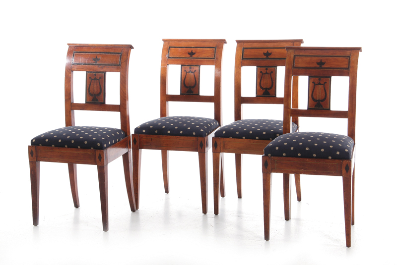 Appraisal: Neoclassical brass and ebony-inlaid fruitwood chairs circa molded crestrail on