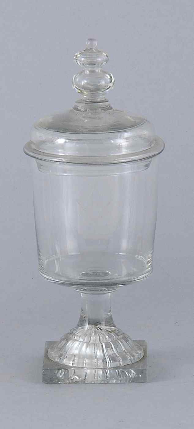 Appraisal: CLEAR BLOWN-MOLDED GLASS LIDDED VESSELEarly th CenturyWith etched Masonic emblem