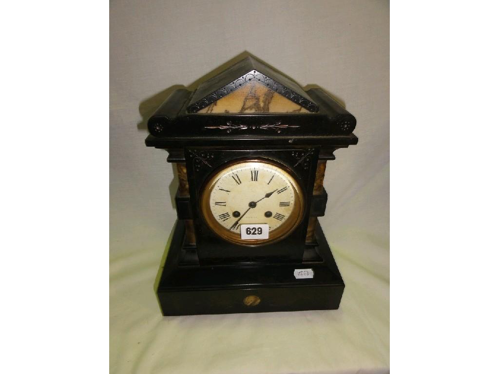 Appraisal: A Victorian black slate and polished marble mantle clock with