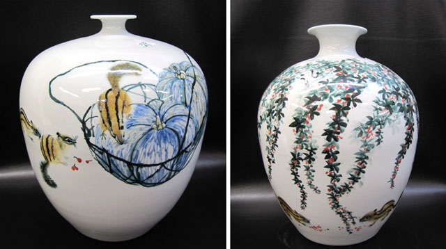 Appraisal: TWO LARGE CHINESE PORCELAIN VASES each decorated with squirrel motifs