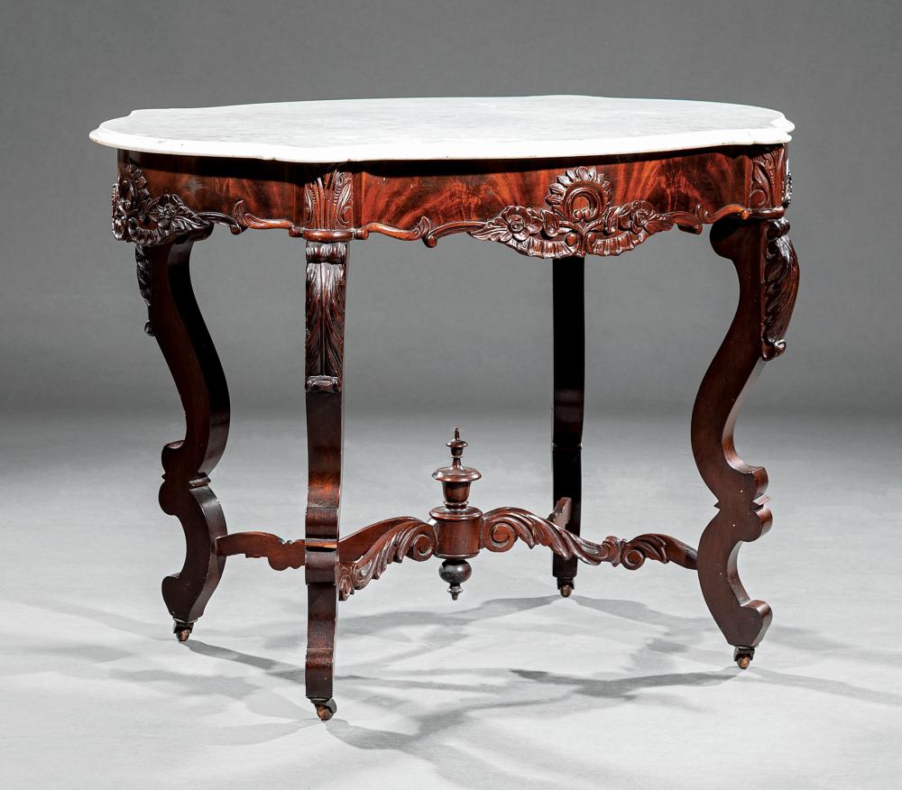 Appraisal: American Rococo Carved Mahogany Center Table mid- th c marble