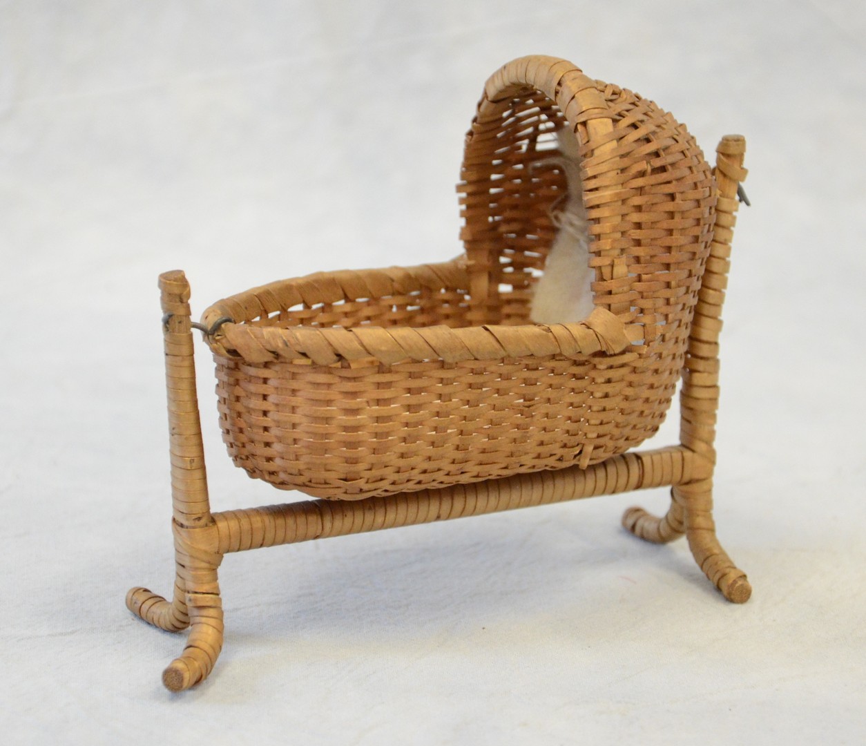 Appraisal: Rare New England ash splint miniature hooded cradle basket on