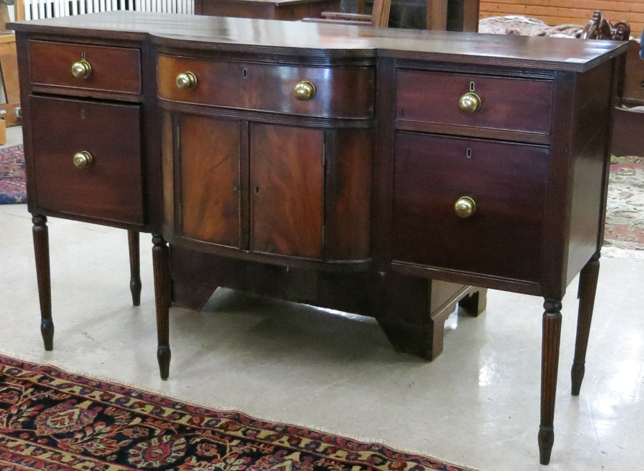 Appraisal: GEORGE III MAHOGANY SIDEBOARD English c - centering a bow-front