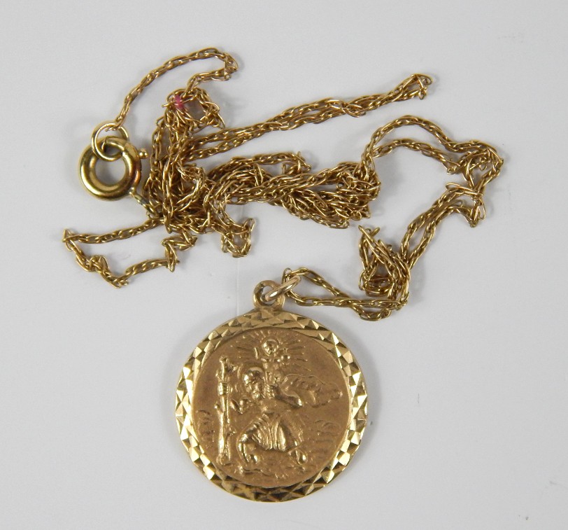 Appraisal: A ct gold St Christopher pendant on a fine chain