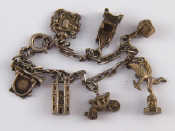 Appraisal: A vintage white metal tests silver charm bracelet