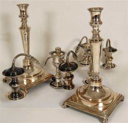 Appraisal: A pair of silver plated three light candelabra the tapered