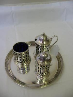 Appraisal: A DANISH CRUET SET the mustard of pierced cylindrical form