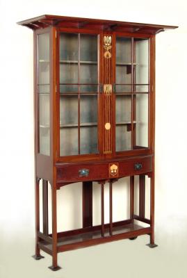 Appraisal: AN ARTS CRAFTS DISPLAY CABINET by Shapland Petter of oblong