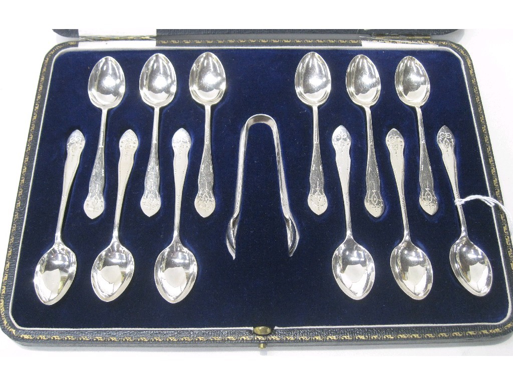 Appraisal: Cased set of twelve silver spoons with tongs Sheffield