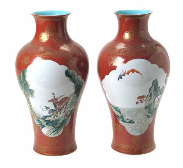 Appraisal: A pair of Chinese coral ground famille rose porcelain vases