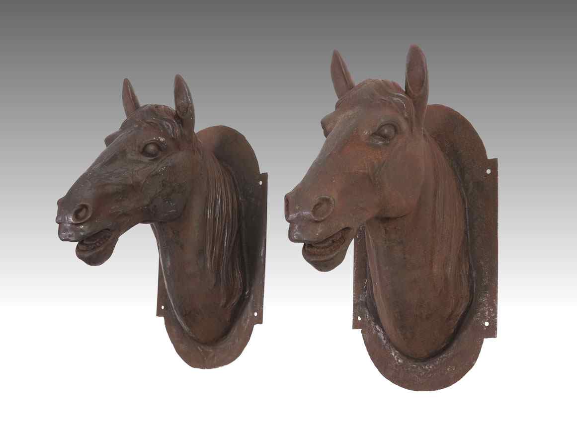 Appraisal: PAIR CAST IRON WALL MOUNT HORSE HEADS Unmarked '' h