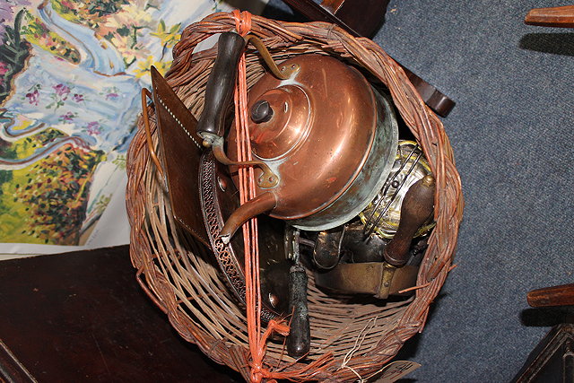 Appraisal: A WICKER BASKET containing a quantity of various metal wares