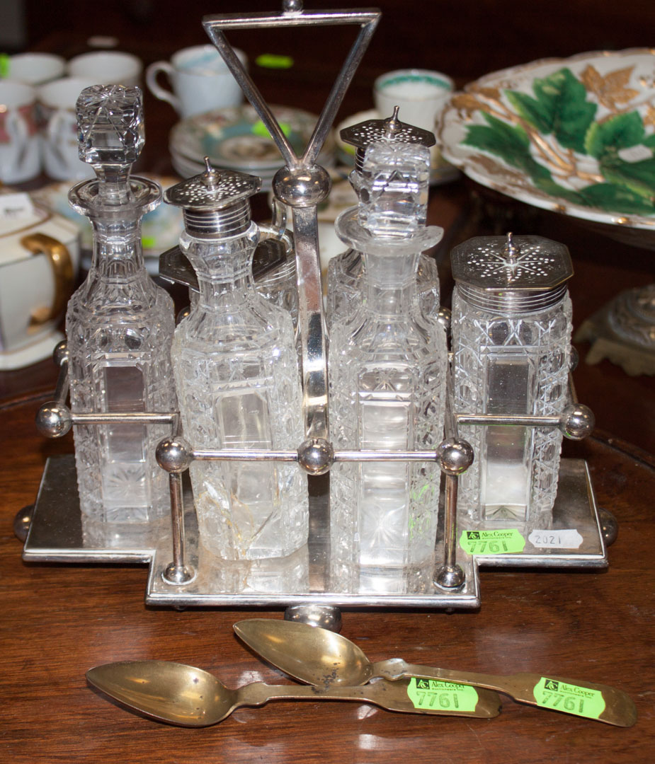 Appraisal: Silver-plated cruet set and two spoons as is one bottle