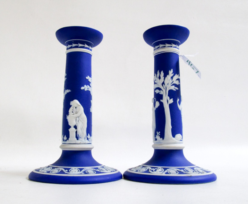 Appraisal: PAIR OF WEDGWOOD JASPERWARE CANDLESTICKS with classical white figures on