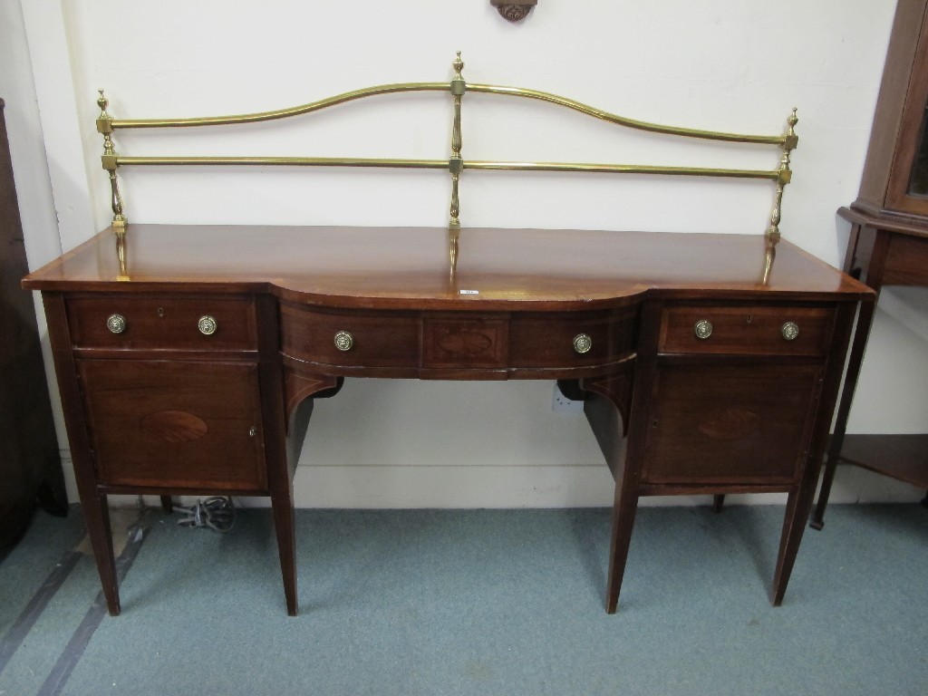 Appraisal: Edwardian mahogany inlaid sideboard with a brass gallery back