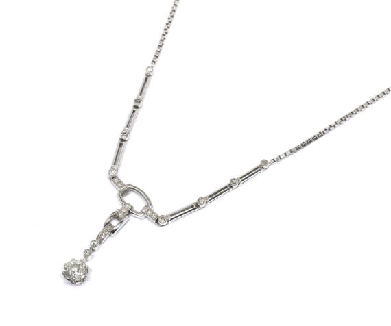 Appraisal: A DIAMOND NECKLACE White gold Charming necklace the top set