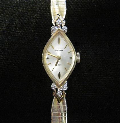 Appraisal: Lady's karat yellow gold wristwatch BulovaDiamond shaped case off-white face