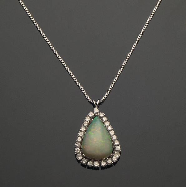 Appraisal: An opal diamond and white gold pendant with chain estimated