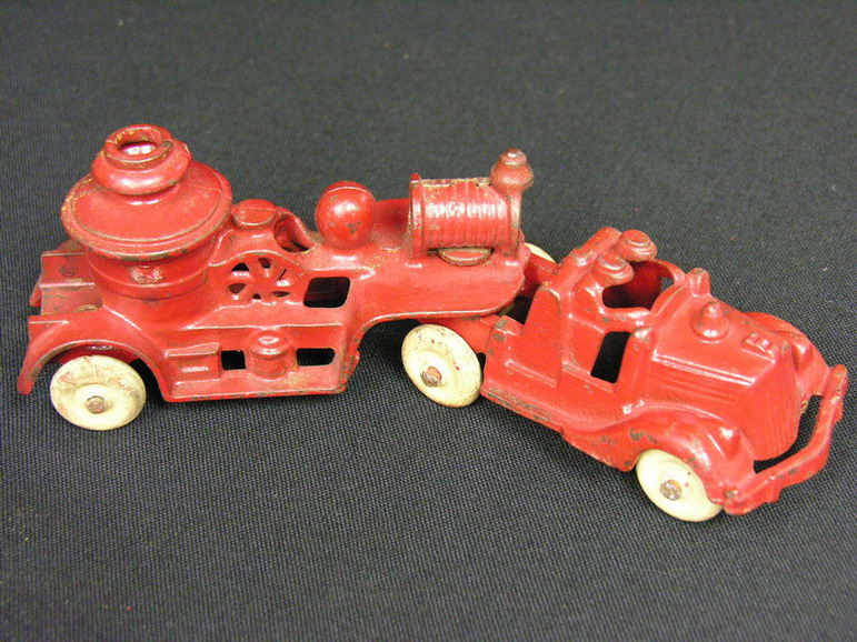 Appraisal: KENTON CAST IRON FIRE TRUCK AND PUMPER Size Condition All