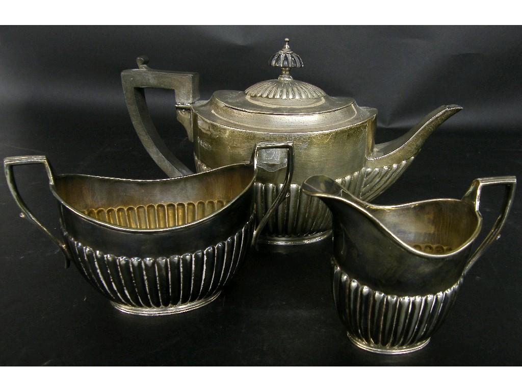 Appraisal: Matched three piece silver boat shaped half fluted tea service