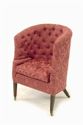 Appraisal: A th century tub shape chair with a button upholstered