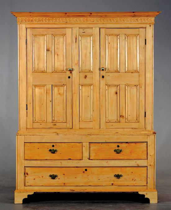 Appraisal: Irish washed pine storage cupboard early th century molded crown