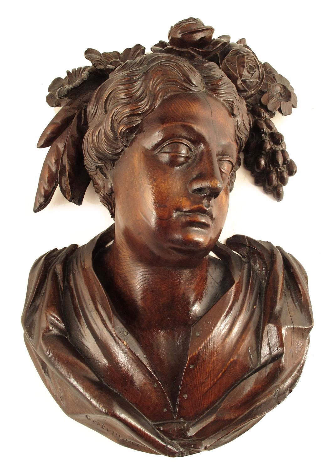 Appraisal: A George II Irish carved and stained pine relief bust