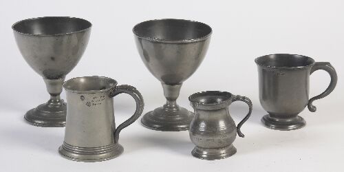 Appraisal: A group of ten th century pewter measures and mugs