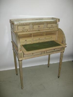 Appraisal: A LADY'S BLEACHED AND PAINTED WALNUT CYLINDER BUREAU the raised