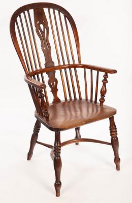 Appraisal: A yew and elm stick back armchair on turned legs