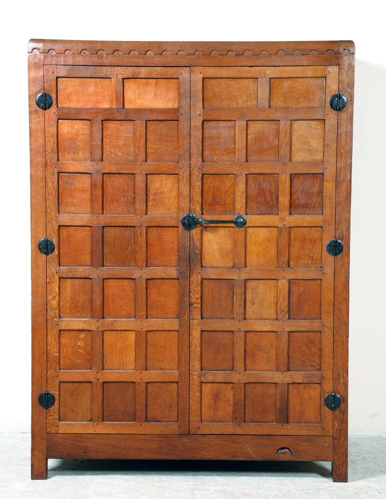 Appraisal: AN ADZED OAK WARDROBE by Robert Mouseman Thompson 's of