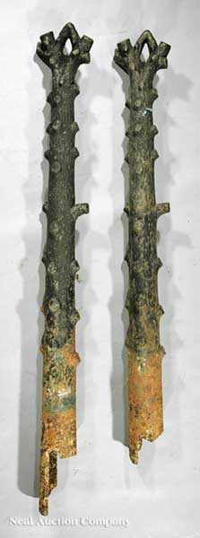 Appraisal: A Pair of American Cast Iron Tree Trunk Hitching Posts