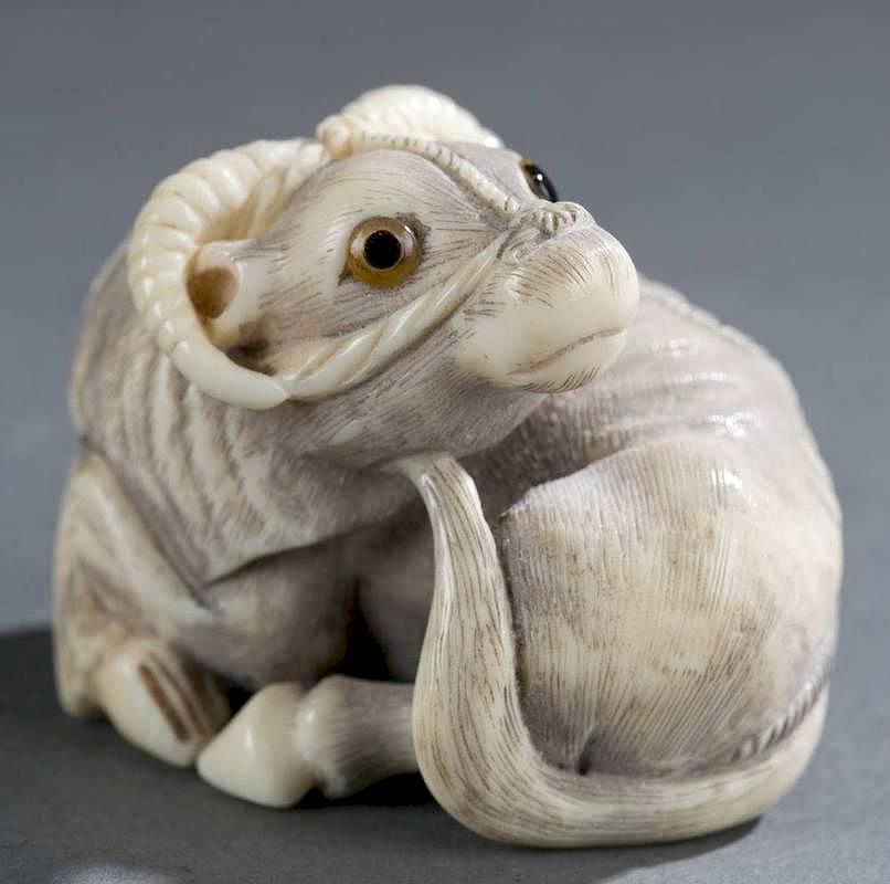 Appraisal: Japanese ivory netsuke of a water buffalo A Japanese ivory