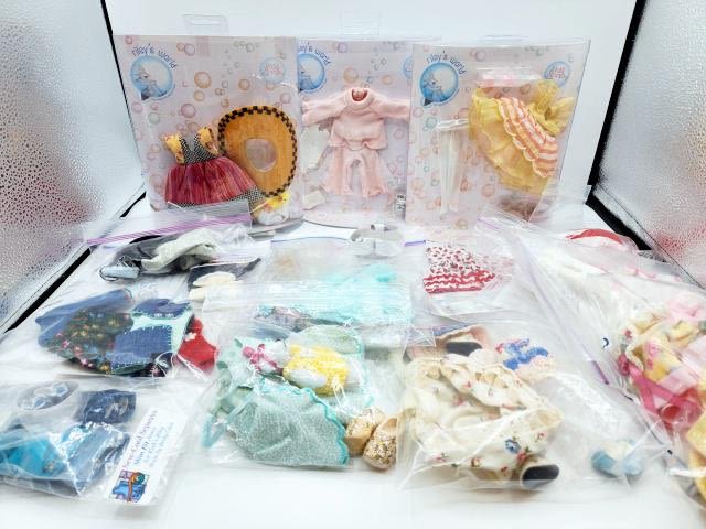 Appraisal: Group of Riley's World Kish and Company Doll Clothing with