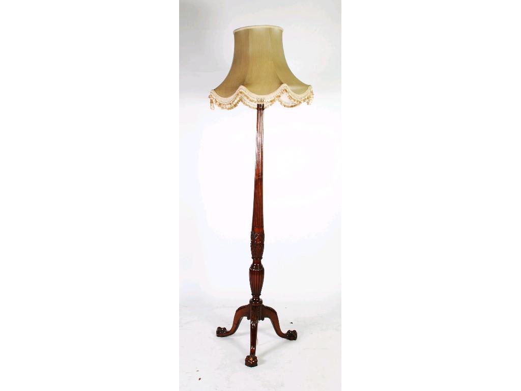 Appraisal: HEPPLEWHITE STYLE MAHOGANY TRIPOD STANDARD LAMP with husk craved capital