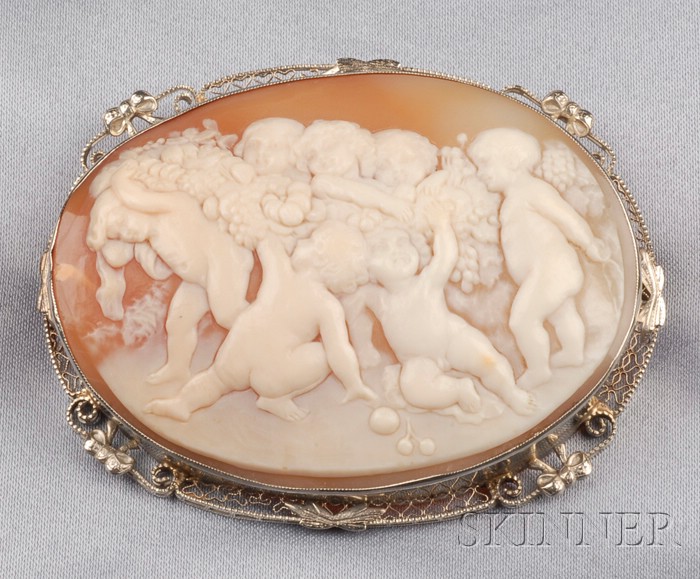 Appraisal: Large Shell Cameo Brooch carved to depict harvesting putti in