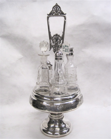 Appraisal: AMERICAN SILVER PLATED ASSEMBLED CASTOR SET having etched glass bottles