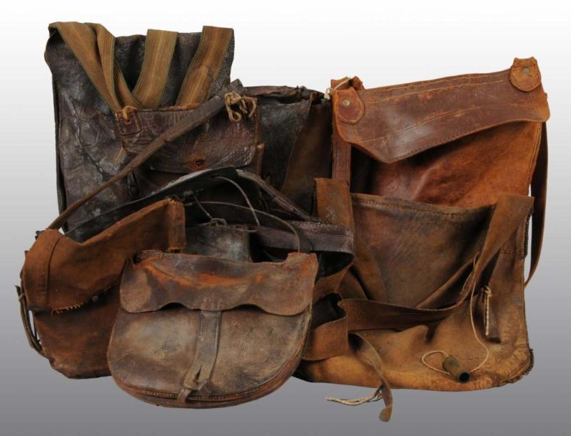 Appraisal: Lot of Leather Pouches Description Worn Condition Very Good Size