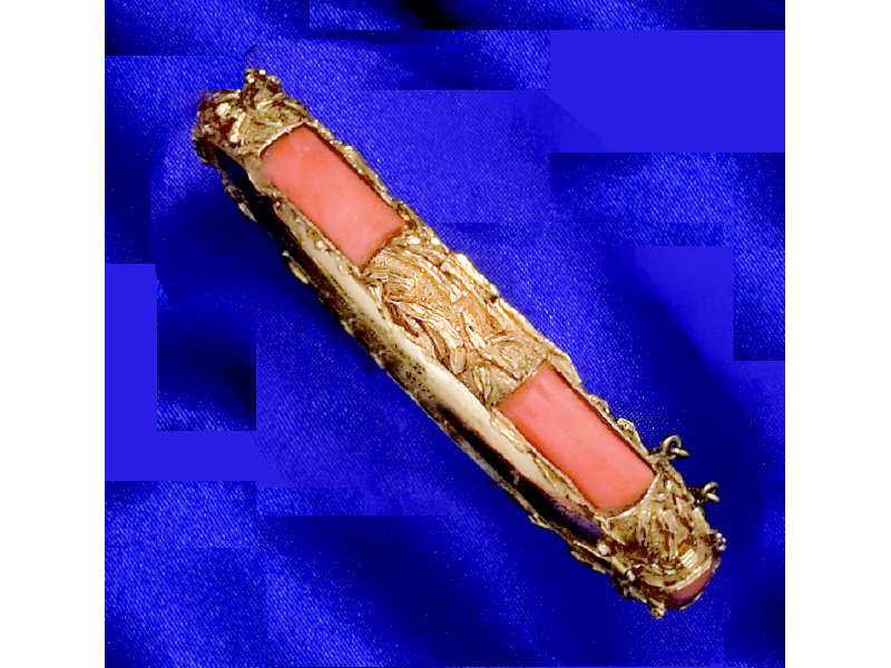 Appraisal: GOLD AND CORAL BANGLE BRACELET k yellow gold bangle with