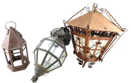 Appraisal: Three metal lanterns of varying size first a four-sided with