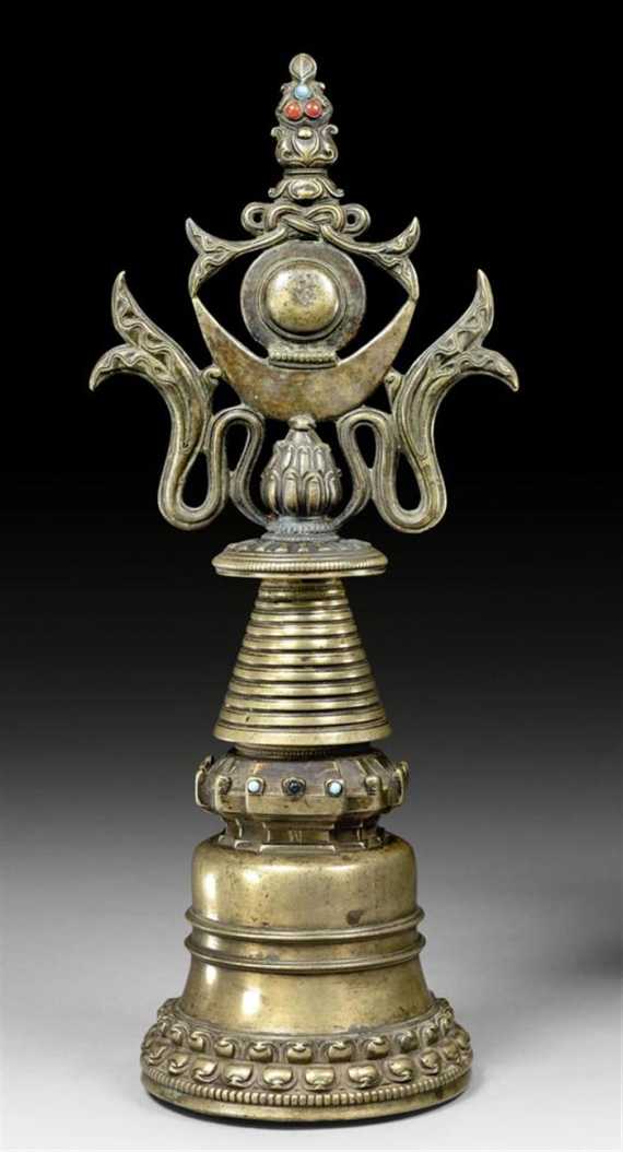 Appraisal: A BRONZE STUPA WITH SUN MOON AND TRIRATNA Tibet ca