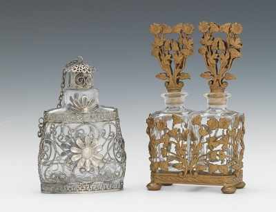 Appraisal: Two Continental Metal Mounted Glass Perfumes The first a clear