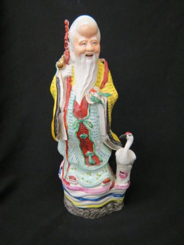 Appraisal: Chinese Porcelain Figurine of an Immortal holding a staff and