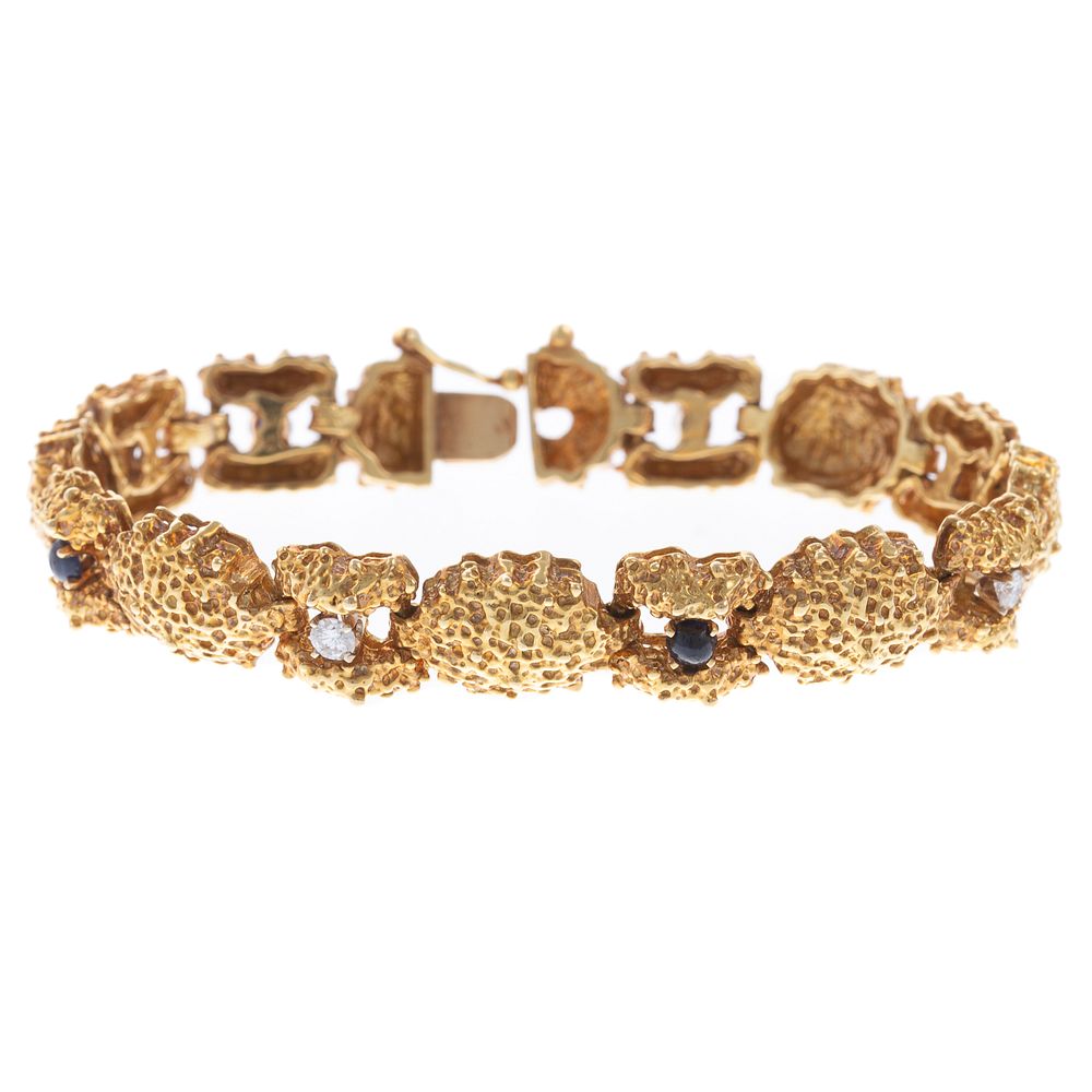 Appraisal: A Brutalist Diamond Sapphire Bracelet in K K yellow gold