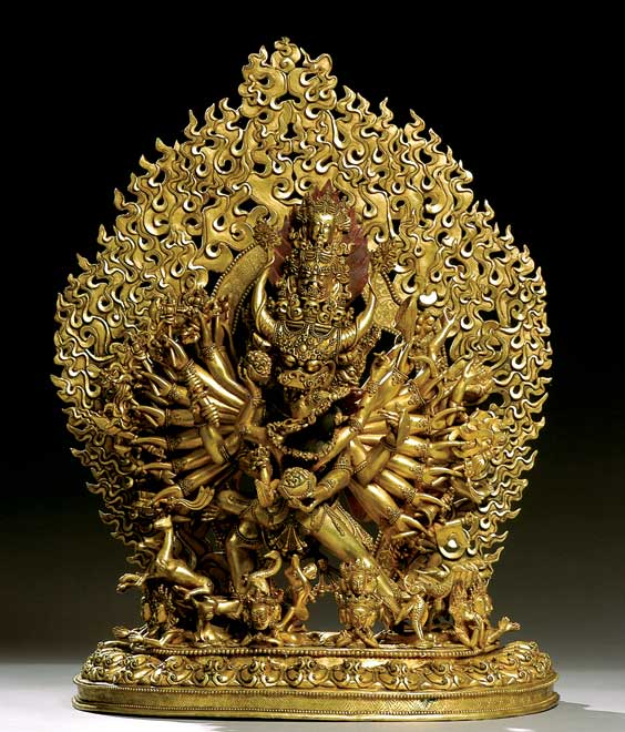 Appraisal: SINO-TIBETAN GILT BRONZE GROUP Very elaborately detailed Sino-Tibetan gilt bronze