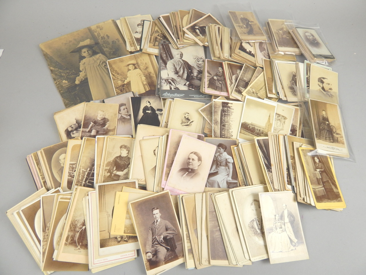 Appraisal: Photography A quantity of studio photographs and carte de visite