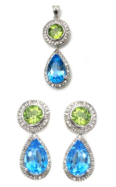 Appraisal: A topaz peridot diamond and k white gold pendant and