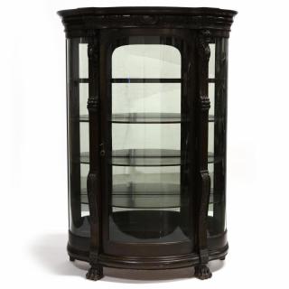 Appraisal: Late Victorian Carved Bowfront China Cabinet circa oak molded and