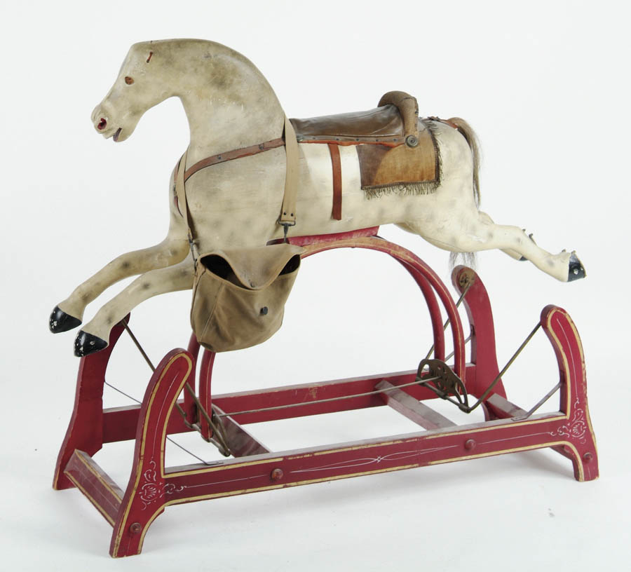 Appraisal: CARVED ROCKING HORSE Dappled pony in cream with soft gray