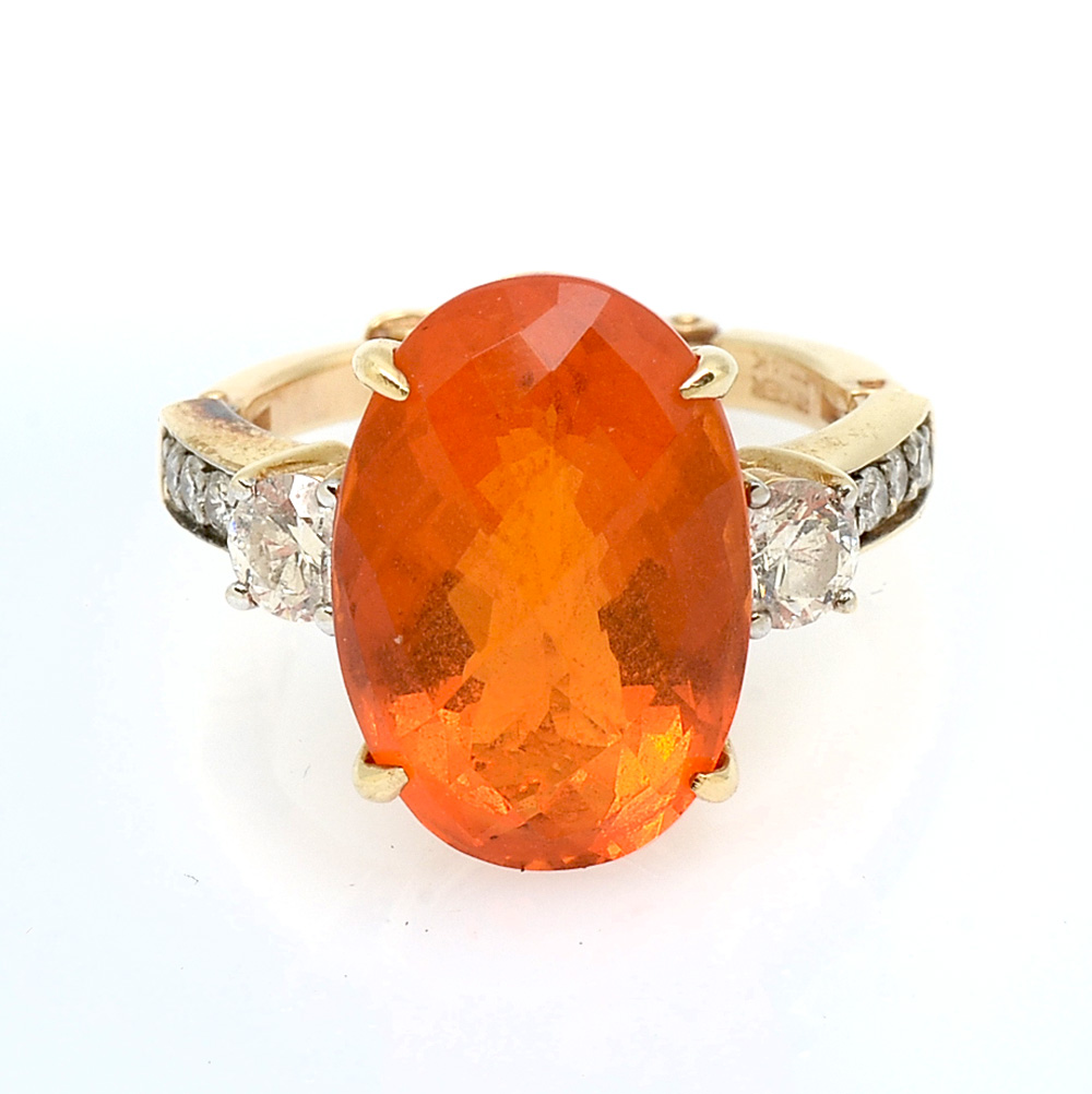 Appraisal: K CT ORANGE FIRE OPAL DIAMOND RING Single CT oval